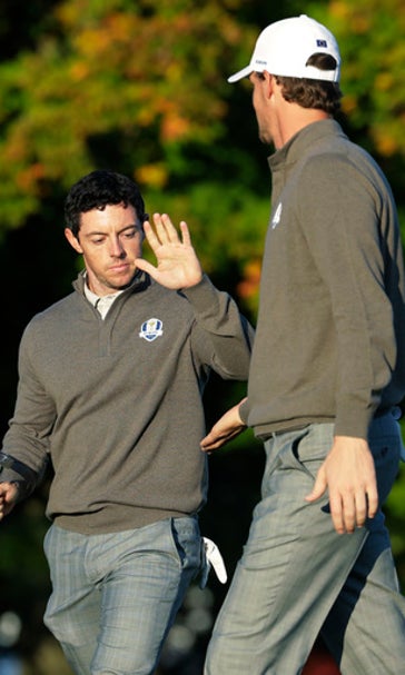 The Latest: Reed holes approach shot on 6 for US boost
